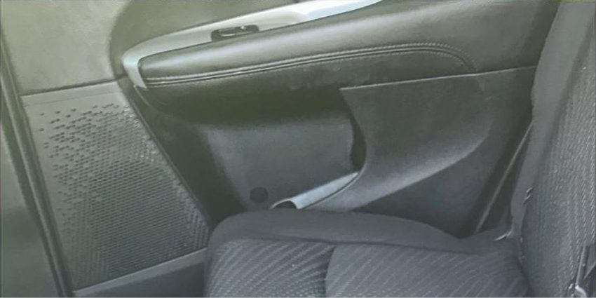 After interior detailing — Door panel — scuff & grime removal